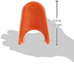 An orange, U-shaped BSN Sports universal football kicking tee with a ribbed surface, shown against a hand for scale.