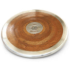 A PORTaPit Olympic wood discus featuring a polished metal rim and center plate, viewed from a high-angle perspective.