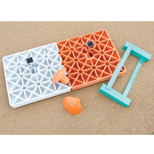 MacGregor double first base set featuring white and orange molded bases with steel stanchions and a green ground anchor.