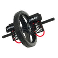 Lifeline Power Wheel exercise equipment featuring a black treaded wheel, foot straps, and red resistance bands on a rod.