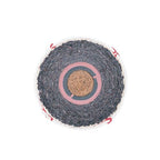 A cross-section view of a Wilson A1010BPROSST baseball showing its cork center, rubber core, and wound yarn layers.