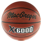 A front-facing view of a brown MacGregor X6000 junior-sized composite basketball with black seams and bold white lettering.