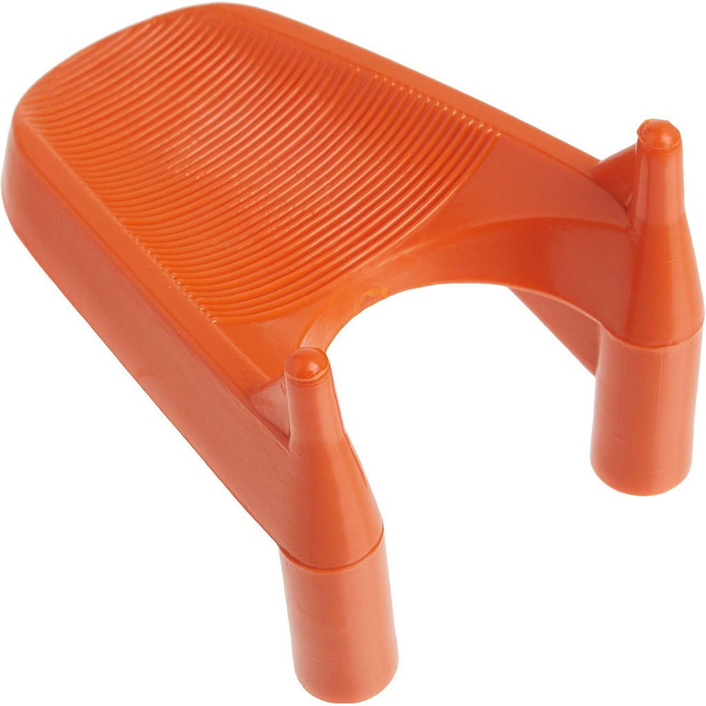 An orange, U-shaped BSN Sports football kicking tee with a ribbed surface and two upright prongs, shown at an angle.