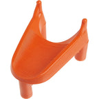An orange, U-shaped football kicking tee with a ribbed surface and four upright prongs, viewed from a high angle.