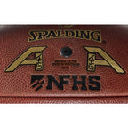 Close-up of a brown Spalding Alpha football featuring gold logos, black NFHS branding, and inflation instructions.