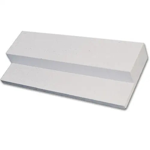 White, rectangular MacGregor step-down pitcher's rubber shown from a high-angle perspective.