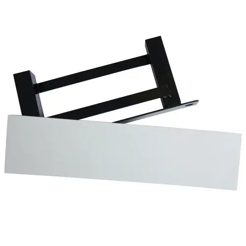 A white rectangular pitcher's plate attached to a black metal anchor system shown from a high-angle perspective.