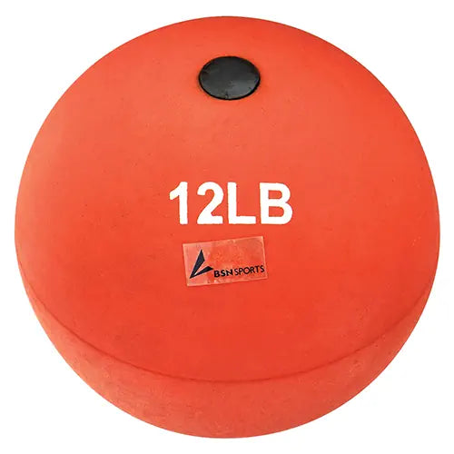 A bright orange, 12-pound BSN Sports indoor training shot put with a black valve, shown from a front-facing perspective.