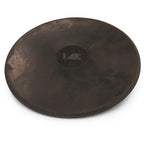 A black, circular PORTaPit rubber practice discus shown from a high-angle view with the weight marking visible in the center.