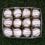 A box of twelve Rawlings RLLB Little League baseballs, each individually wrapped in clear plastic and arranged in a grid.