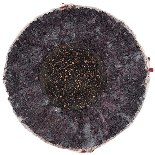 A top-down view of a Rawlings RLLB baseball, showing the dark, textured core surrounded by a grey, fibrous outer layer.